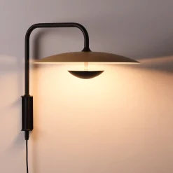 Aplique de pared orientable