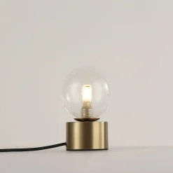 Lámpara de mesa con esfera de cristal